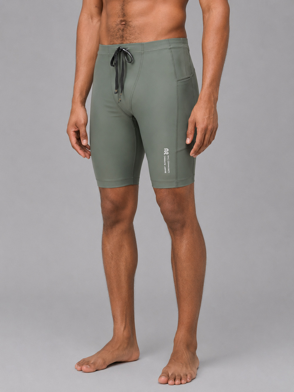 NWOT Bandit Running Superbeam Half Tights Shorts Men M Green 7 Pocket Stretch